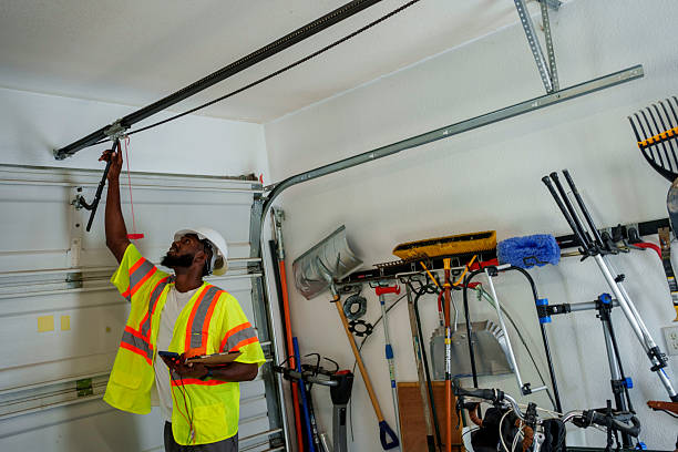 Professional Garage Door Panel Replacement technician working in Olivet, MI